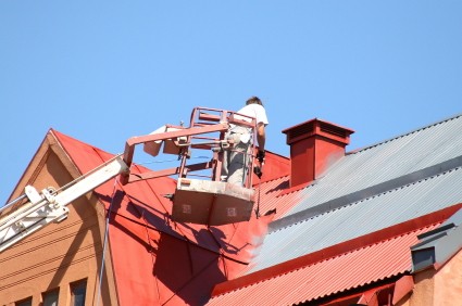 Roof painting in Watts, California by Kern Industries